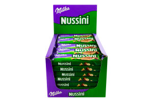 Вафля с начинкой с фундуком и какао усыпанная измельченным фундуком и покрытая молочным шоколадом Nussini Milka м/у 31г