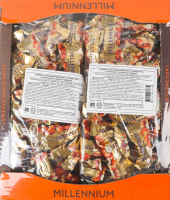 Цукерки шоколадні з начинкою та цілими горіхами Golden Nut Millennium кг