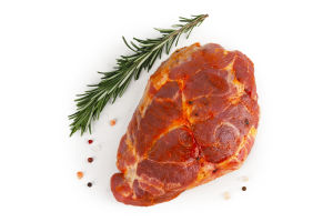 Свинячий стейк з ошийка в пряному маринаді в/у