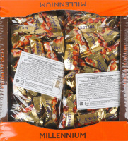 Конфеты шоколадные с начинкой и целыми орехами Golden Nut Millennium кг