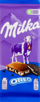 Шоколад молочний з молочною начинкою зі смаком ванілі та шматочками печива Oreo Milka м/у 100г