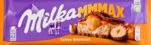 Шоколад молочний з цілими лісовими горіхами, молочною та карамельною начинкою Toffee wholenut Mmmax Milka м/у 300г