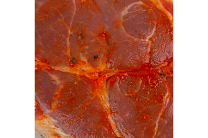 Свинячий стейк з ошийка в пряному маринаді в/у