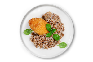 Гречана каша з печерицями та котлетою по-київськи