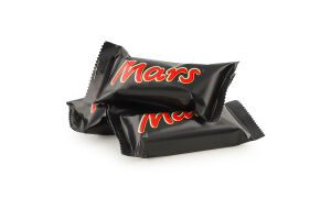 Батончик із нугою та карамеллю вкритий молочним шоколадом Minis Mars кг