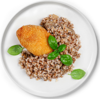 Гречана каша з печерицями та котлетою по-київськи