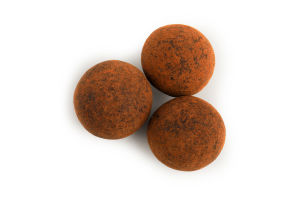 Фундук в молочному шоколаді покр какао-порошком