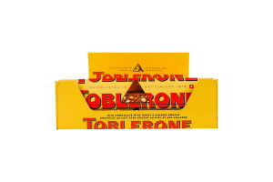 Шоколад молочний з медово-мигдальною нугою Toblerone к/у 4х25г